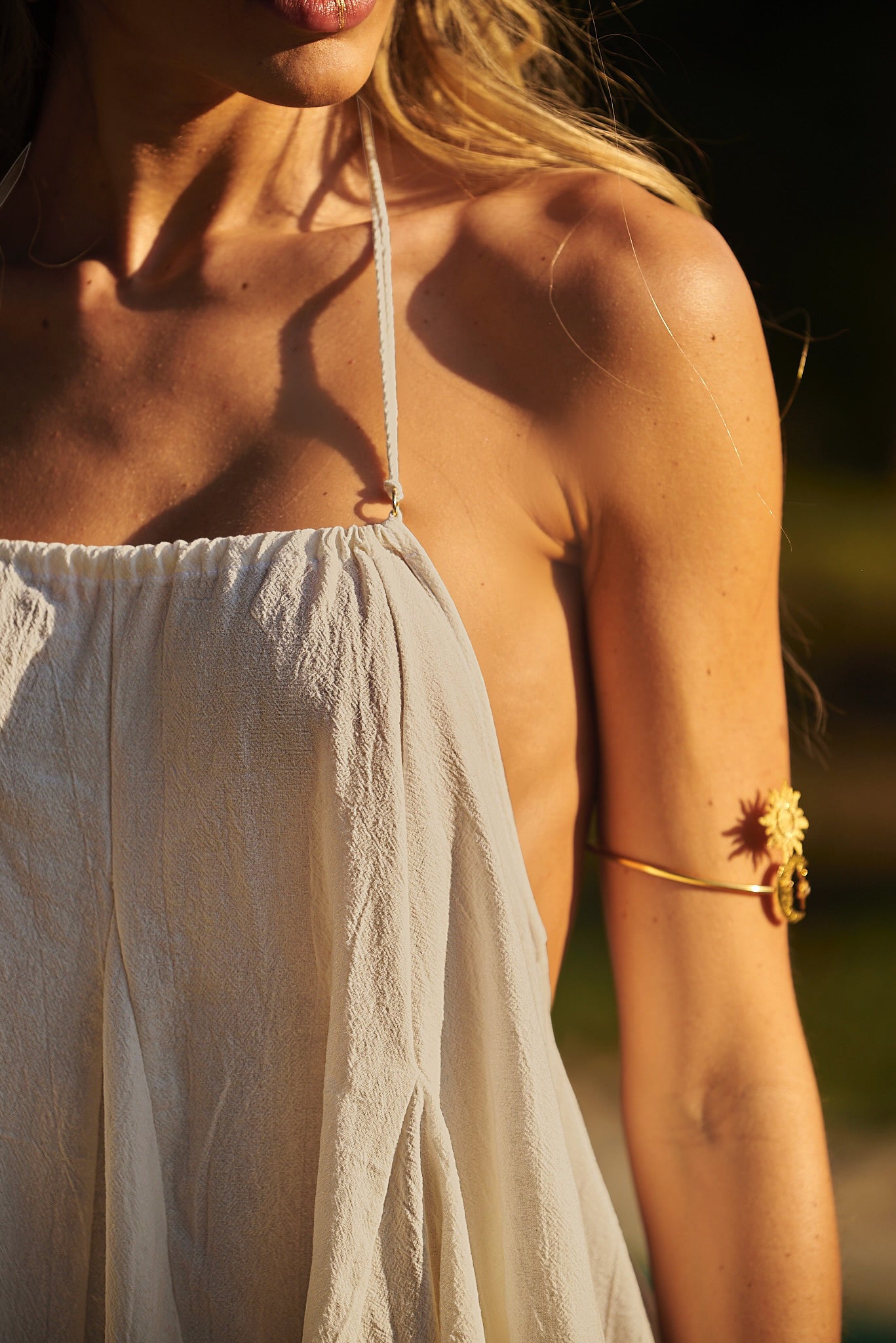 Pool party ready in a nude Lonarc cotton short dress