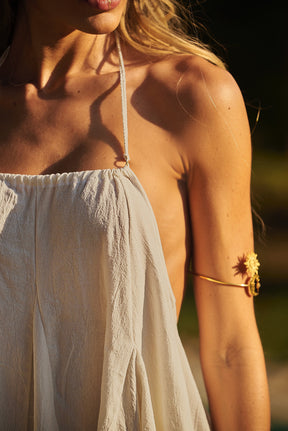 Pool party ready in a nude Lonarc cotton short dress